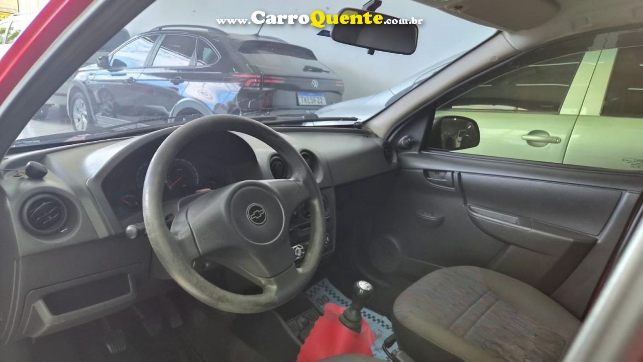 CHEVROLET   CELTA SPIRIT LT 1.0 MPFI 8V FLEXP. 5P   VERMELHO 2011 1.0 FLEX - Loja