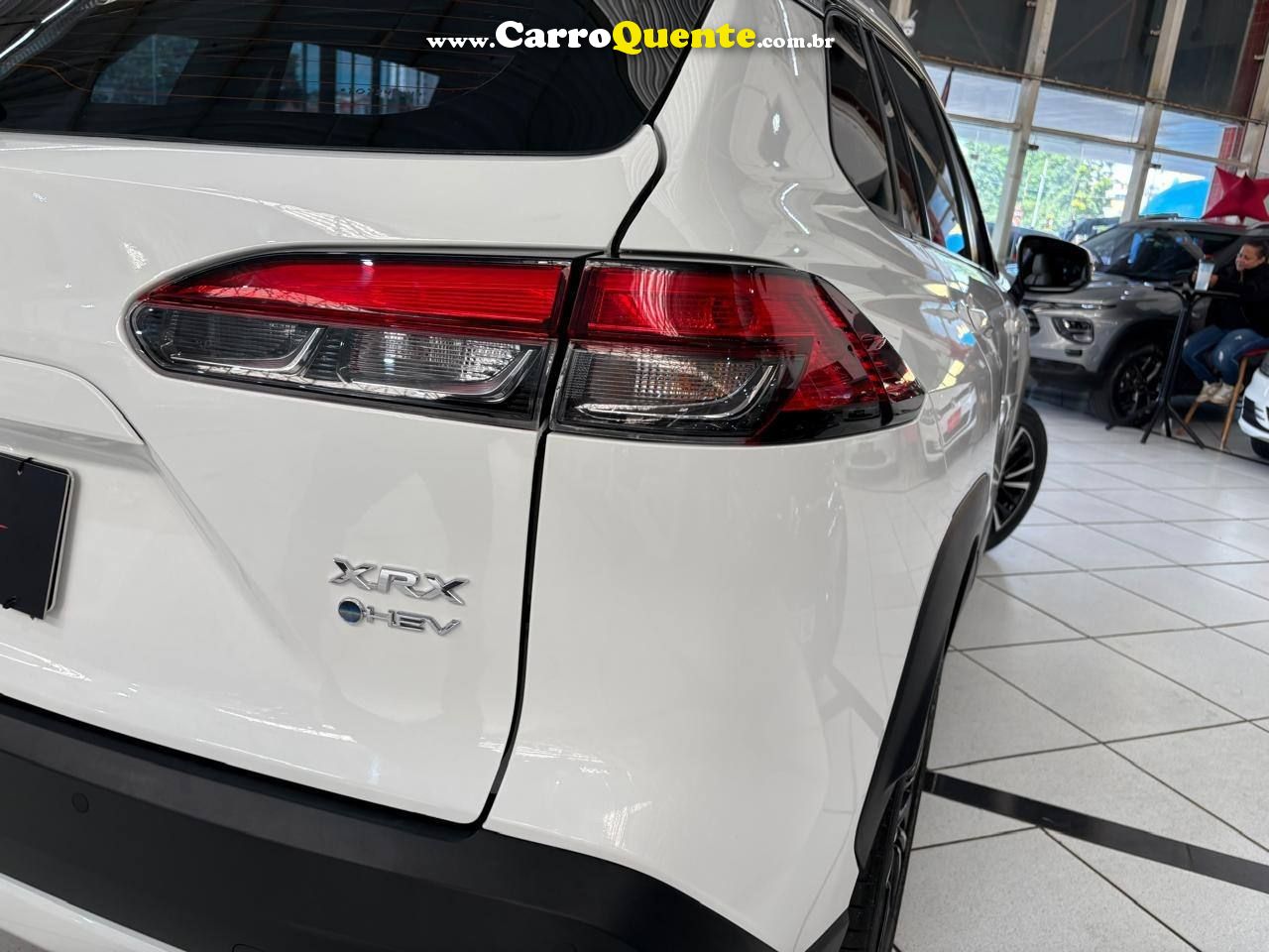 COROLLA CROSS 1.8 VVT-I HYBRID FLEX XRX CVT C/ TETO SOLAR 2026 - Loja