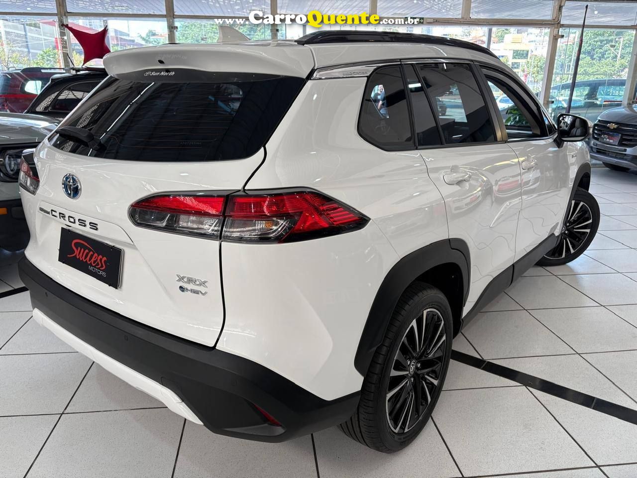 COROLLA CROSS 1.8 VVT-I HYBRID FLEX XRX CVT C/ TETO SOLAR 2026 - Loja