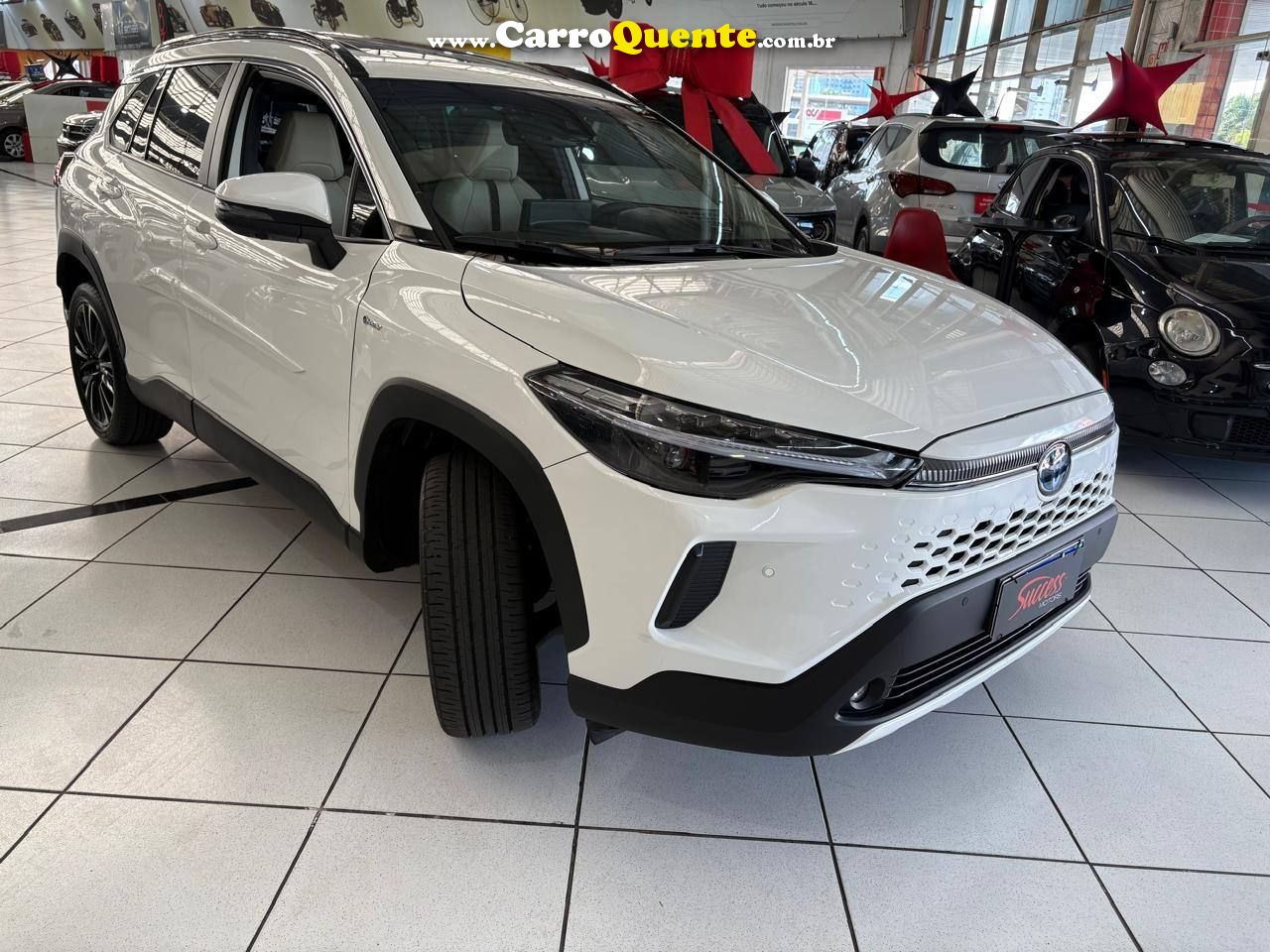 COROLLA CROSS 1.8 VVT-I HYBRID FLEX XRX CVT C/ TETO SOLAR 2026 - Loja
