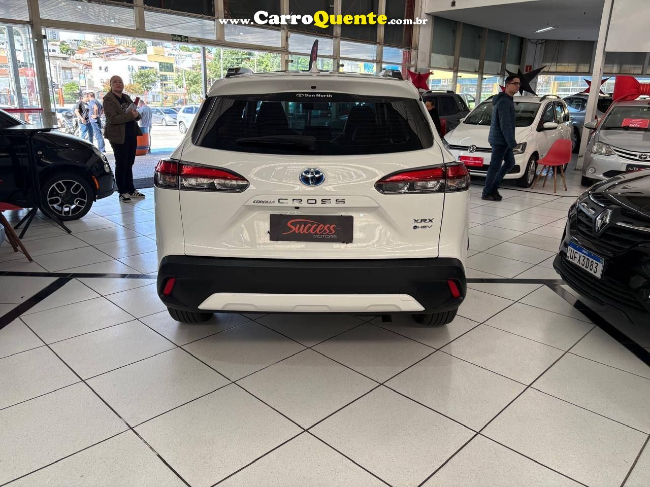 COROLLA CROSS 1.8 VVT-I HYBRID FLEX XRX CVT C/ TETO SOLAR 2026 - Loja