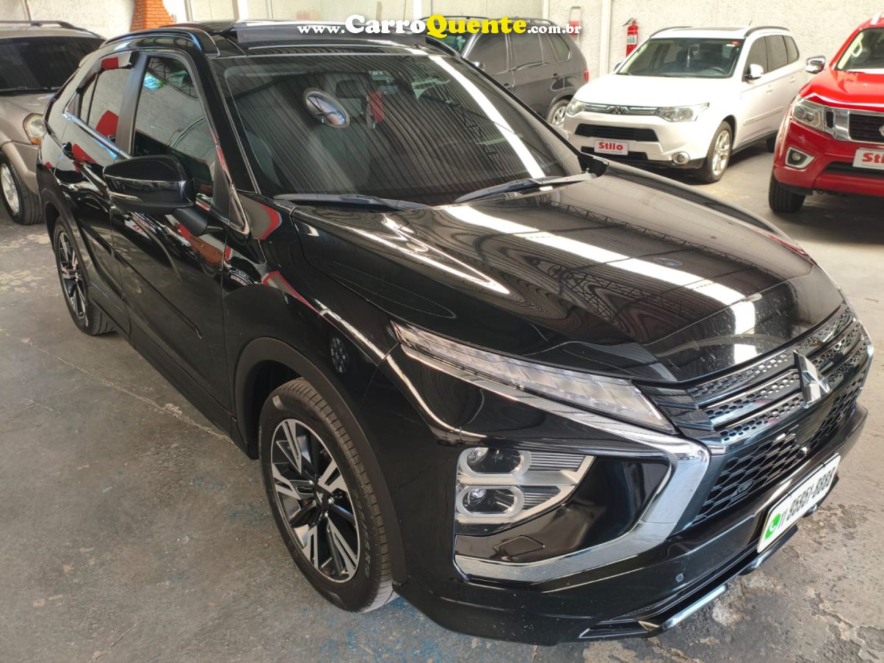 MITSUBISHI   ECLIPSE CROSS HPE 1.5 16V 165CV AUT.   PRETO 2023 1.5 GASOLINA - Loja