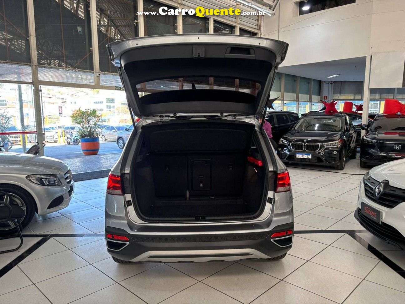VOLKSWAGEN TAOS 250 TSI HIGHLINE 2024 - Loja