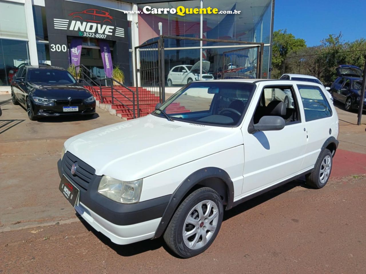 FIAT   UNO MILLE CELEBCELEB.ECON 1.0 F.FLEX 2P   BRANCO 2013 1.0 GASOLINA - Loja