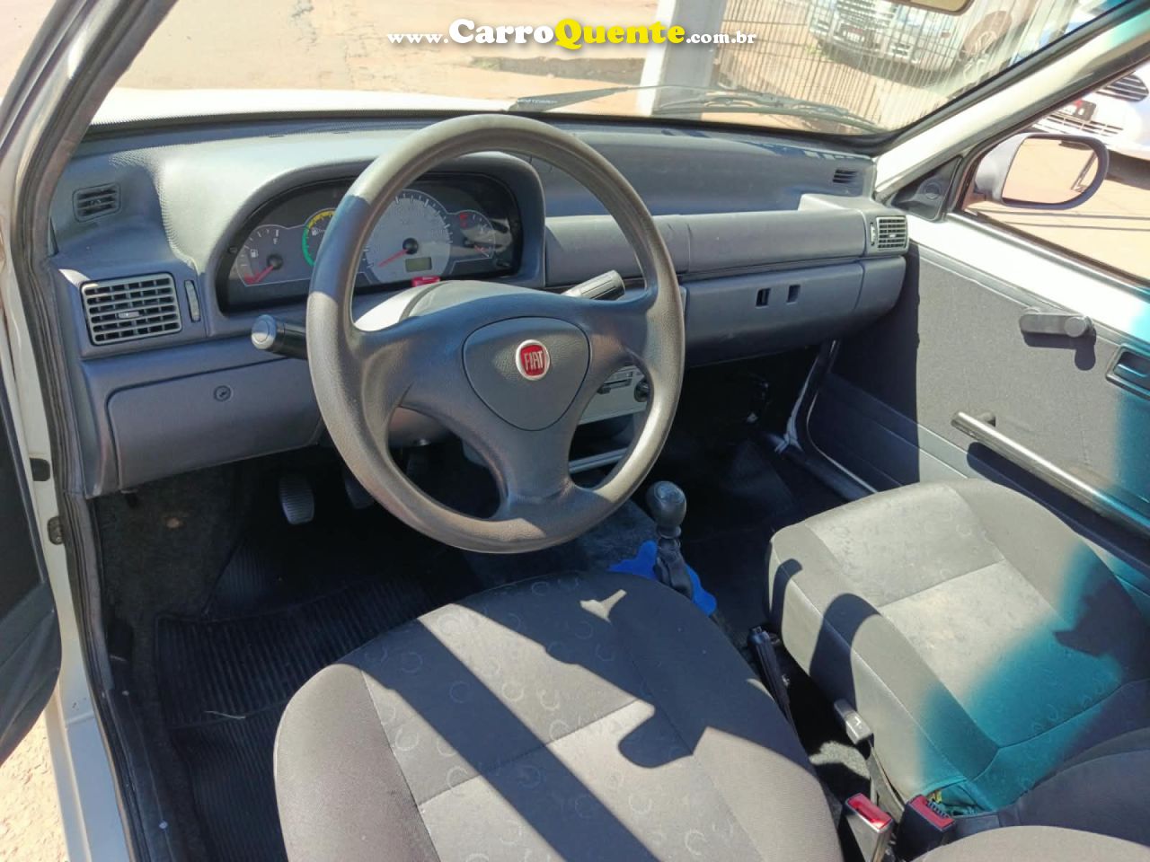 FIAT   UNO MILLE CELEBCELEB.ECON 1.0 F.FLEX 2P   BRANCO 2013 1.0 GASOLINA - Loja