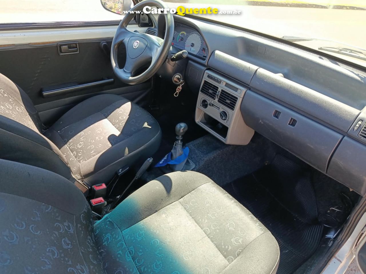 FIAT   UNO MILLE CELEBCELEB.ECON 1.0 F.FLEX 2P   BRANCO 2013 1.0 GASOLINA - Loja