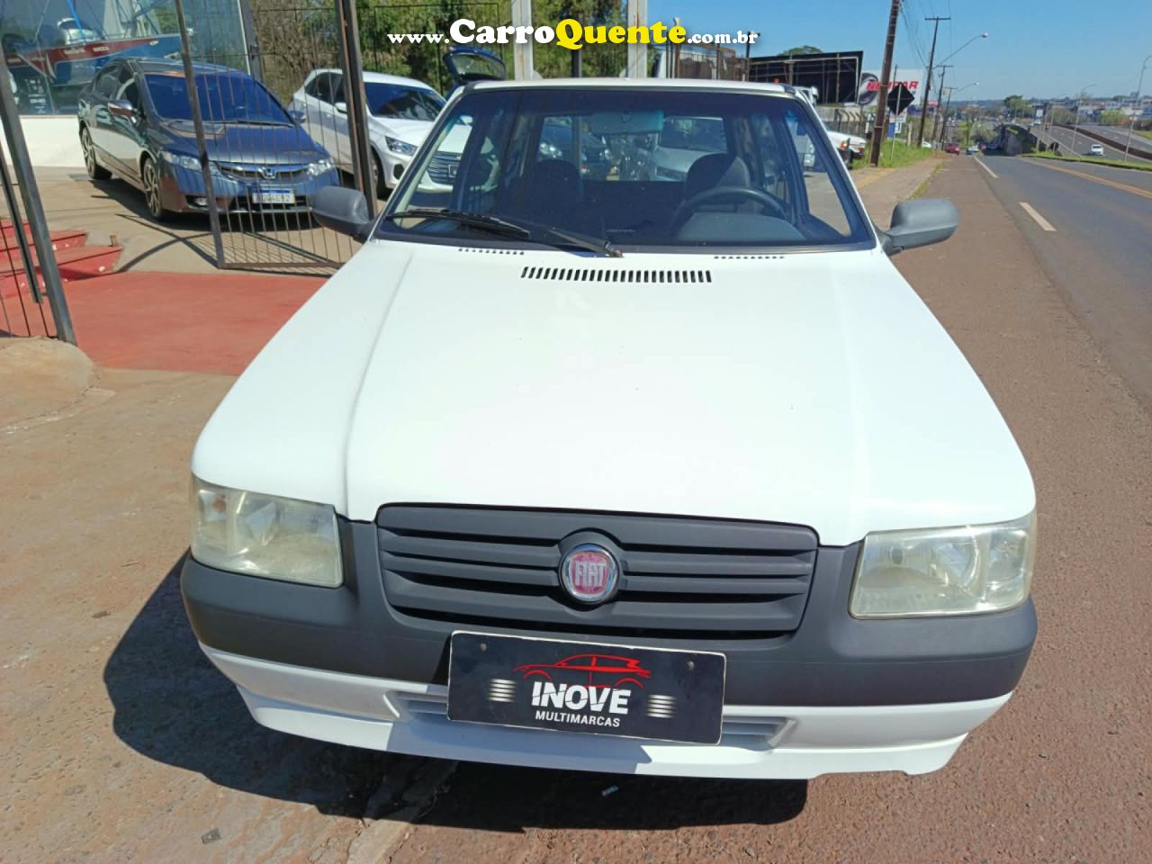 FIAT   UNO MILLE CELEBCELEB.ECON 1.0 F.FLEX 2P   BRANCO 2013 1.0 GASOLINA - Loja