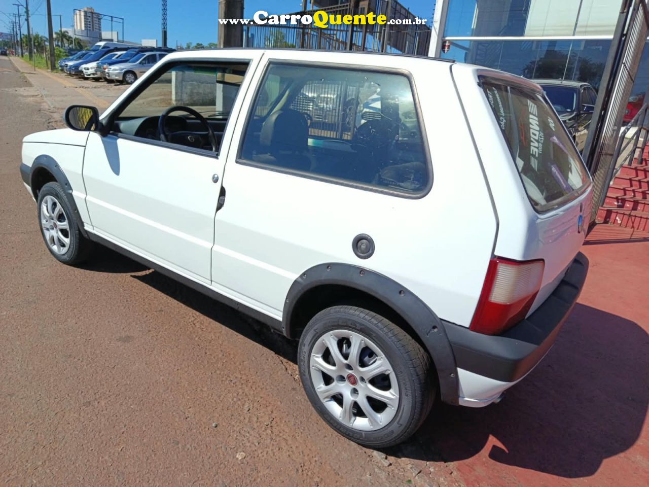FIAT   UNO MILLE CELEBCELEB.ECON 1.0 F.FLEX 2P   BRANCO 2013 1.0 GASOLINA - Loja