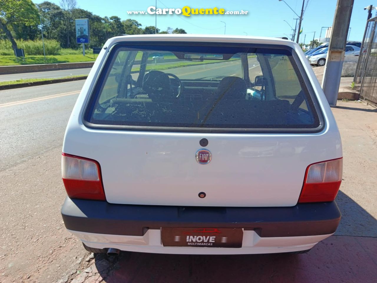 FIAT   UNO MILLE CELEBCELEB.ECON 1.0 F.FLEX 2P   BRANCO 2013 1.0 GASOLINA - Loja