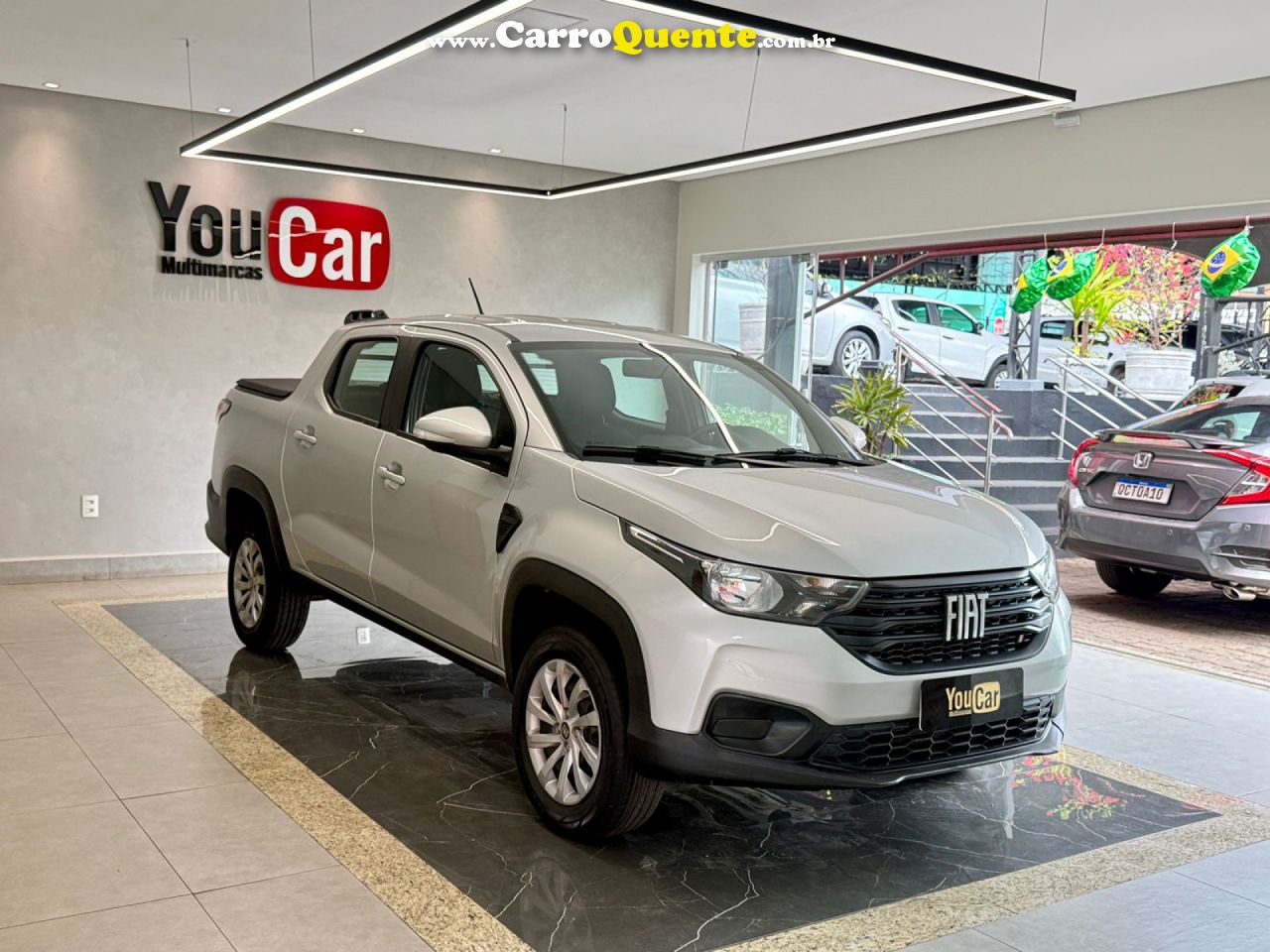 FIAT   STRADA FREEDOM 1.3 FLEX 8V CD   PRATA 2023 1.3 FLEX - Loja