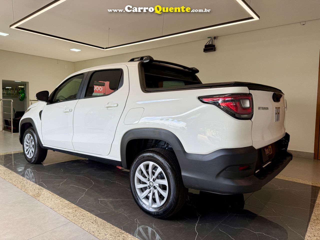 FIAT   STRADA FREEDOM 1.3 FLEX 8V CD   BRANCO 2024 1.3 FLEX - Loja