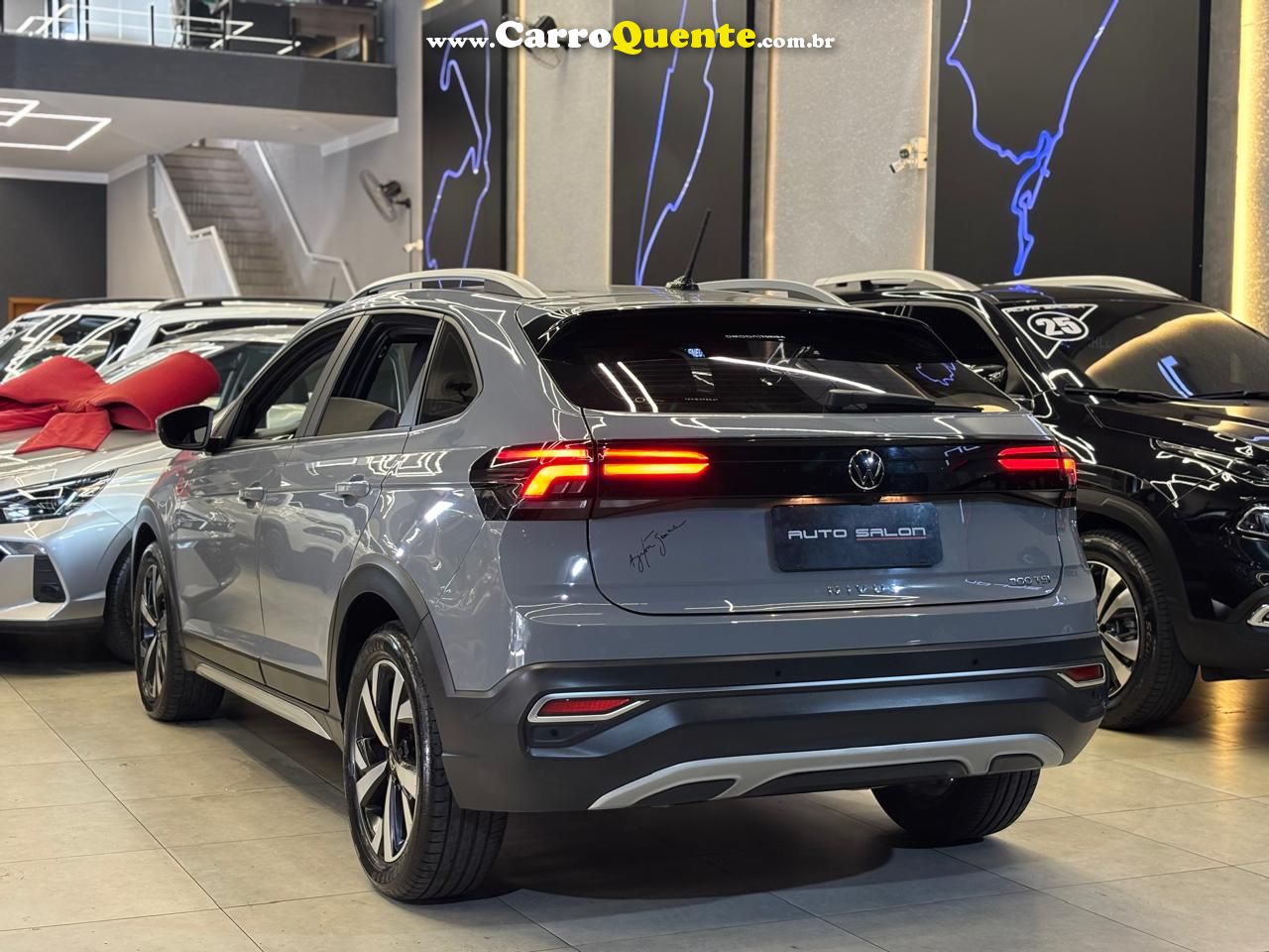 VOLKSWAGEN NIVUS 1.0 200 TSI TOTAL HIGHLINE 2023 - Loja