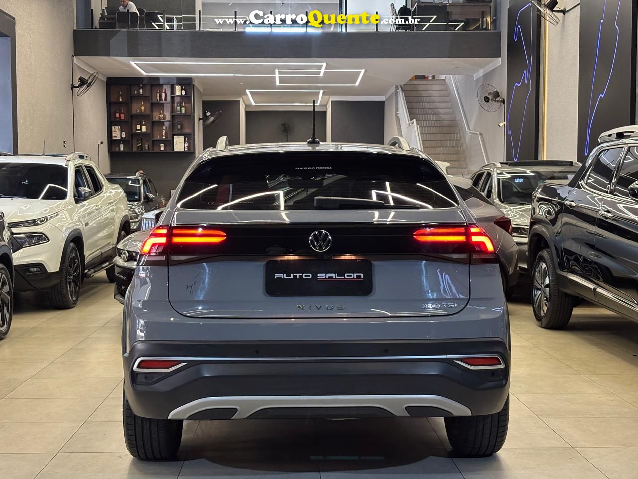 VOLKSWAGEN NIVUS 1.0 200 TSI TOTAL HIGHLINE 2023 - Loja