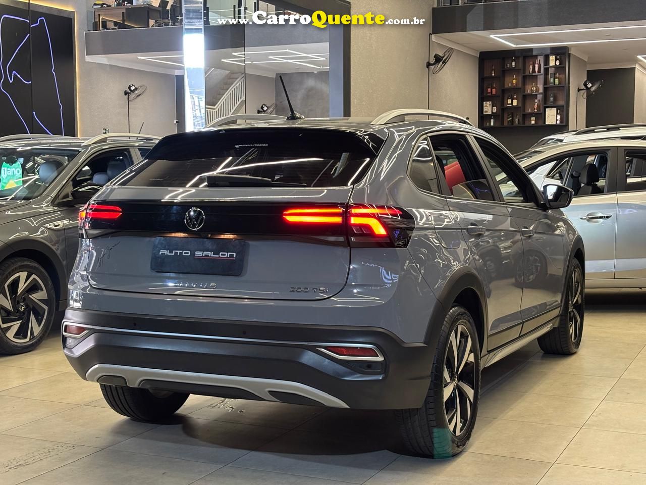 VOLKSWAGEN NIVUS 1.0 200 TSI TOTAL HIGHLINE 2023 - Loja