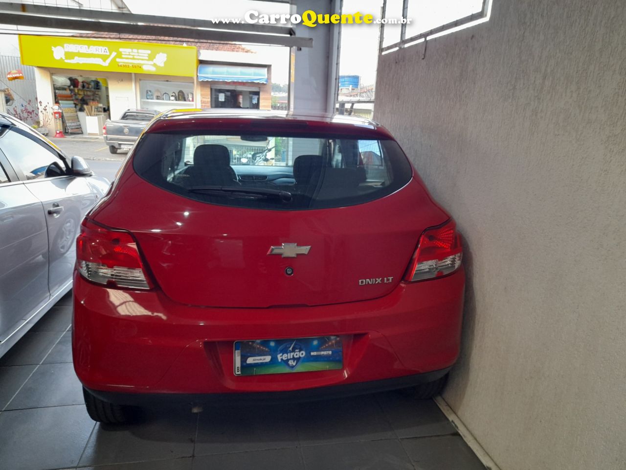 CHEVROLET   ONIX HATCH LS 1.0 8V FLEXPOWER 5P MEC.   VERMELHO 2014 1.0 FLEX - Loja