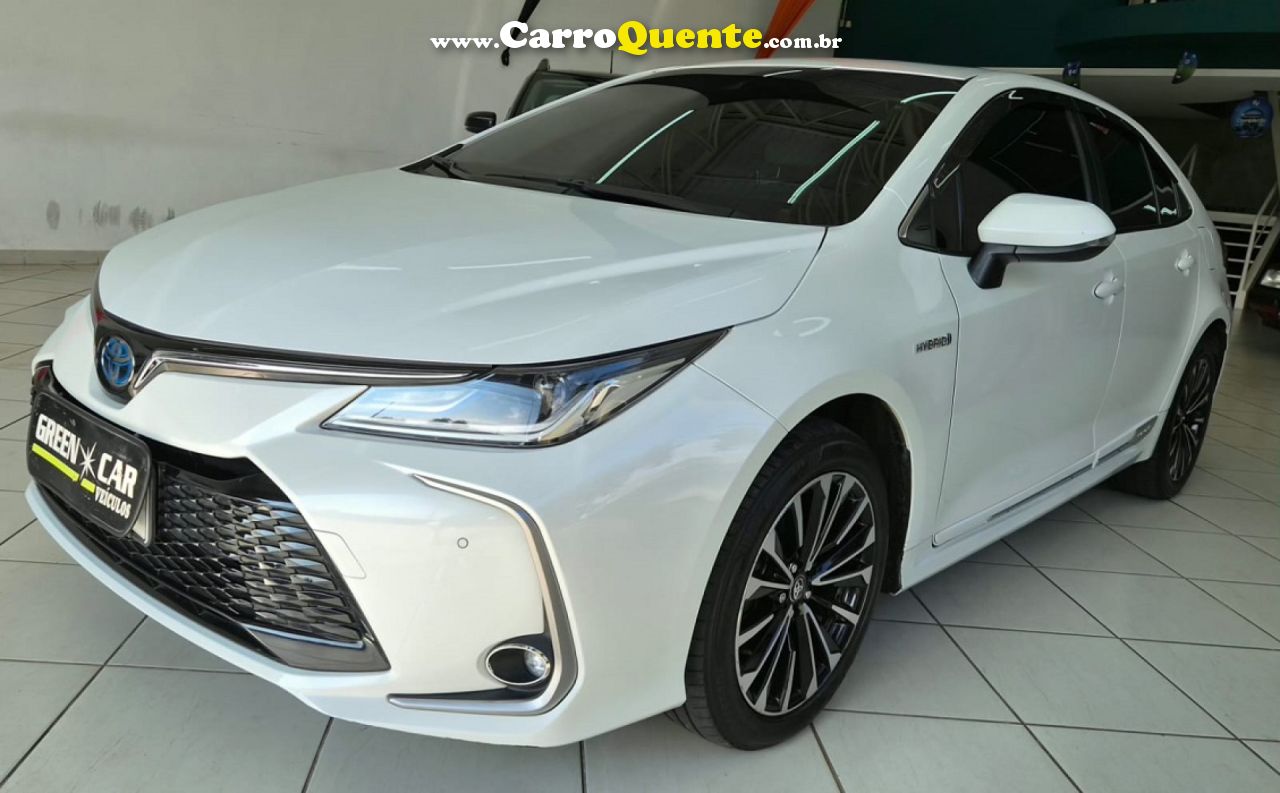 TOYOTA   COROLLA ALTIS PREM. 1.8 AUT. (HÍBRIDO)   BRANCO 2024 1.8 FLEX - Loja