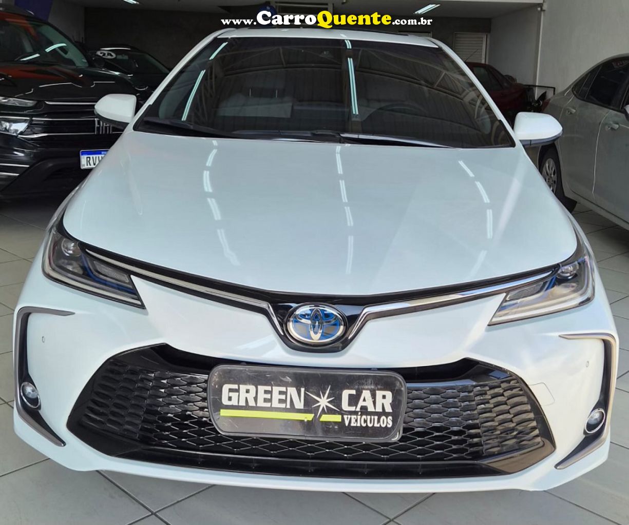 TOYOTA   COROLLA ALTIS PREM. 1.8 AUT. (HÍBRIDO)   BRANCO 2024 1.8 FLEX - Loja