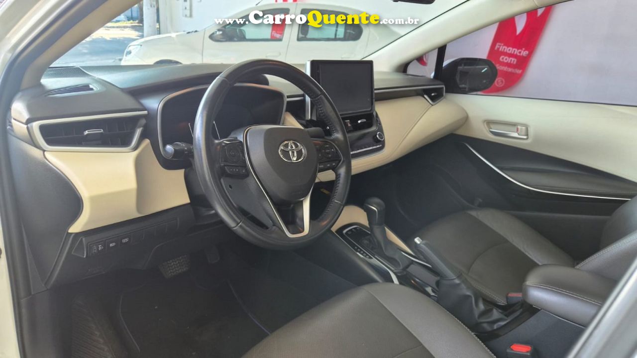 TOYOTA   COROLLA ALTIS PREM. 1.8 AUT. (HÍBRIDO)   BRANCO 2024 1.8 FLEX - Loja
