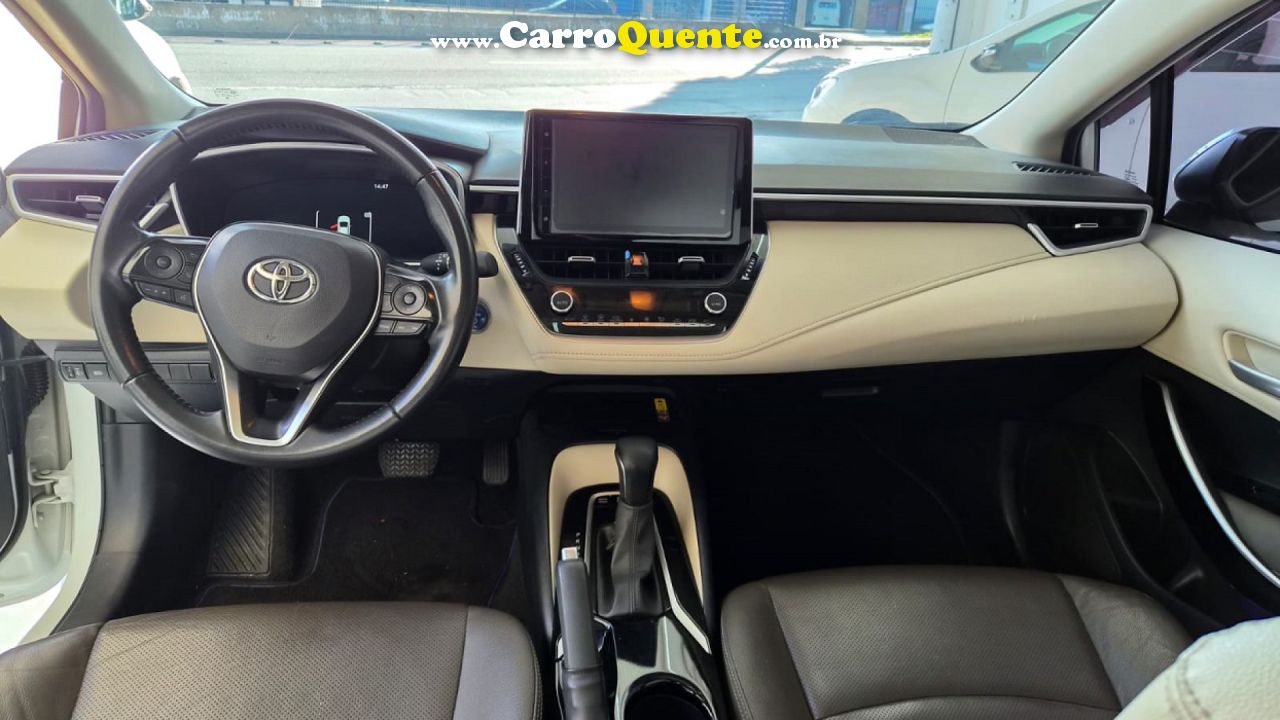 TOYOTA   COROLLA ALTIS PREM. 1.8 AUT. (HÍBRIDO)   BRANCO 2024 1.8 FLEX - Loja