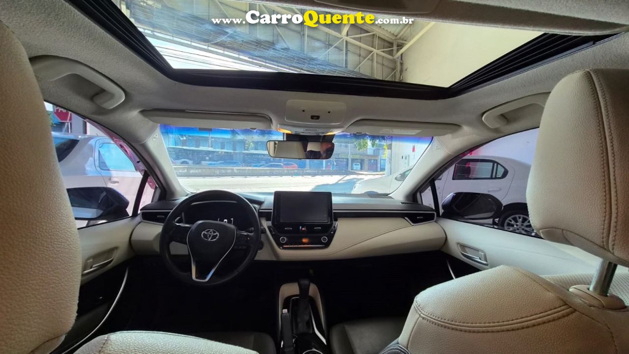 TOYOTA   COROLLA ALTIS PREM. 1.8 AUT. (HÍBRIDO)   BRANCO 2024 1.8 FLEX - Loja