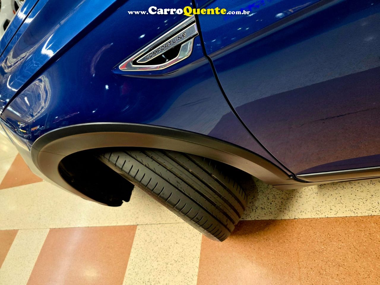 VOLKSWAGEN NIVUS 1.0 200 TSI TOTAL COMFORTLINE 2024 - Loja
