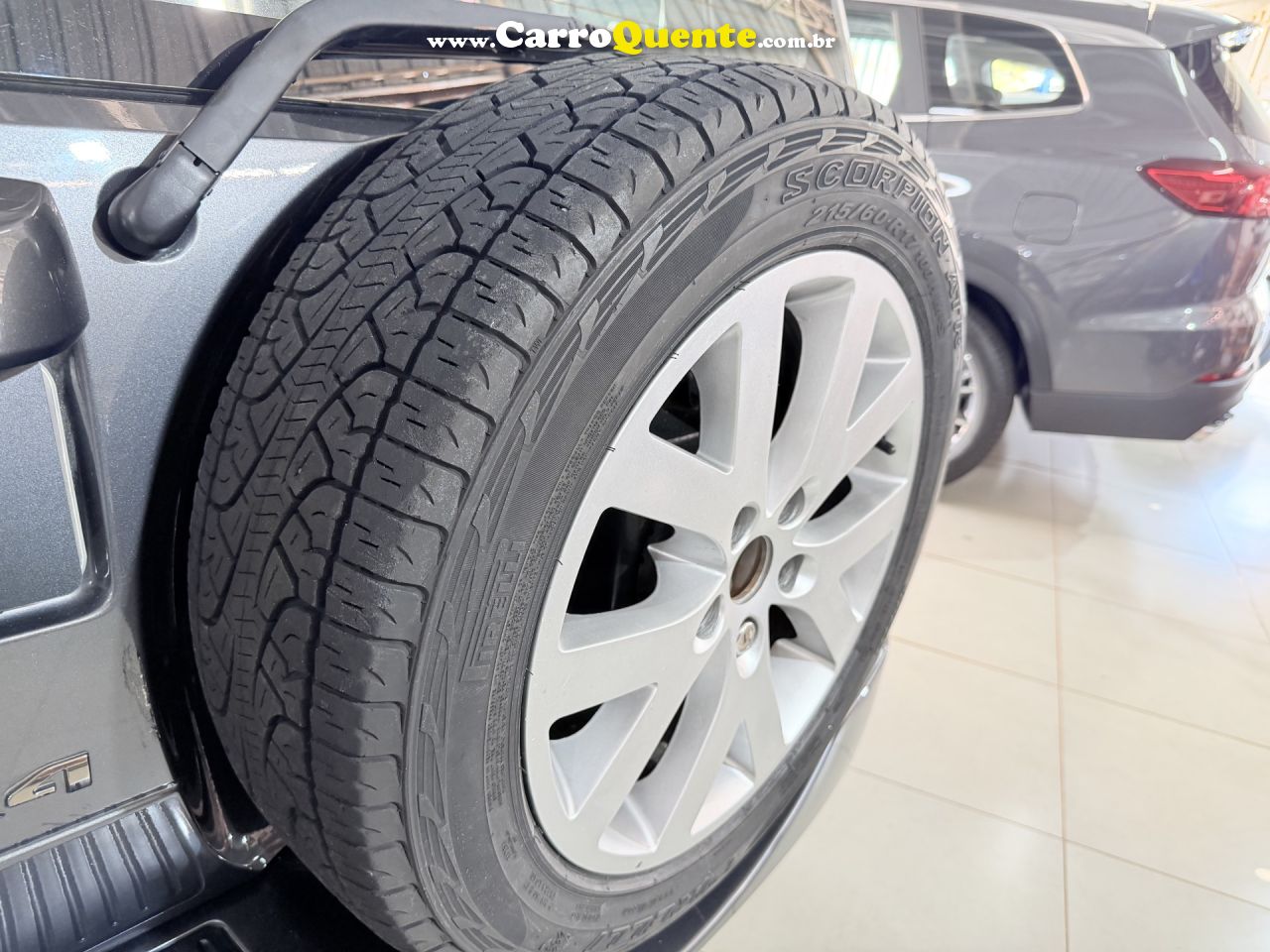 MITSUBISHI   PAJERO TR4 2.0 FLEX 16V 4X2 AUT.   CINZA 2014 2.0 FLEX - Loja