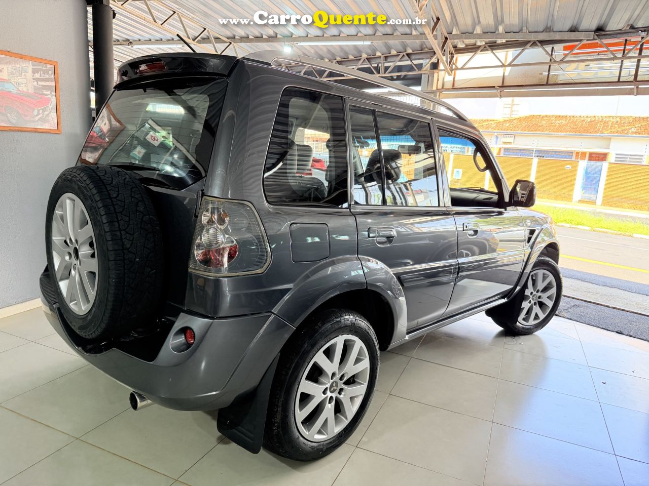 MITSUBISHI   PAJERO TR4 2.0 FLEX 16V 4X2 AUT.   CINZA 2014 2.0 FLEX - Loja