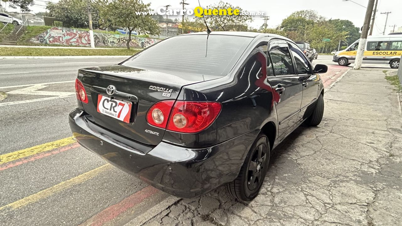 TOYOTA   COROLLA XEI 1.81.8 FLEX 16V AUT.   PRETO 2006 1.8 GASOLINA - Loja