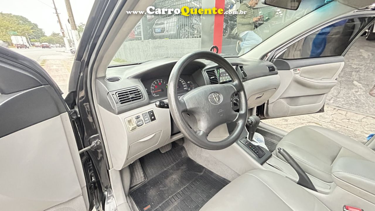 TOYOTA   COROLLA XEI 1.81.8 FLEX 16V AUT.   PRETO 2006 1.8 GASOLINA - Loja