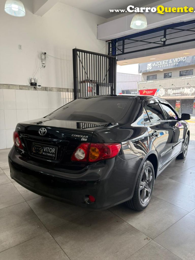 TOYOTA   COROLLA XEI 1.81.8 FLEX 16V AUT.   PRETO 2009 1.8 FLEX - Loja