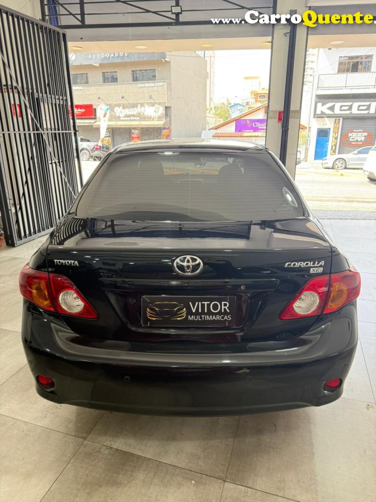 TOYOTA   COROLLA XEI 1.81.8 FLEX 16V AUT.   PRETO 2009 1.8 FLEX - Loja