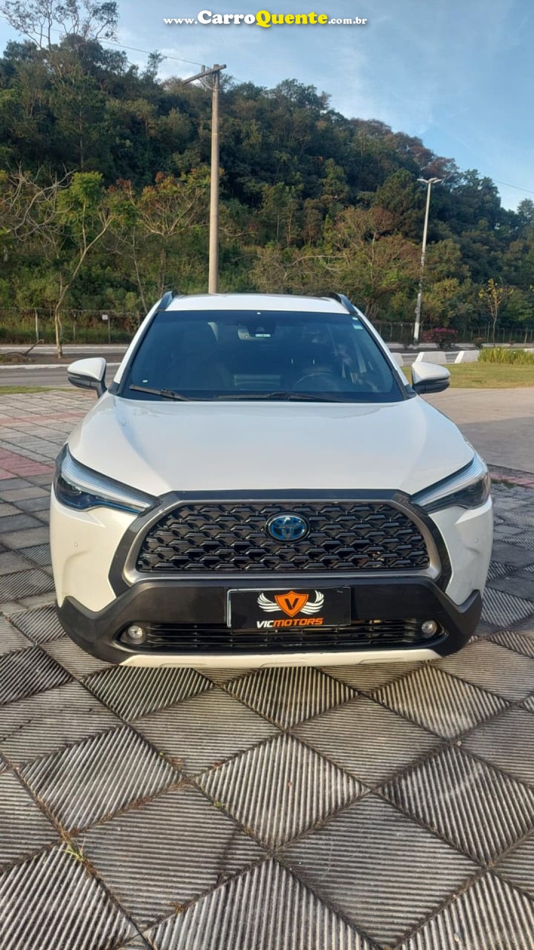 TOYOTA   COROLLA CROSS XRV 1.8 16V AUT.(HYBRID)   BRANCO 2023 1.8 FLEX E ELÉTRICO - Loja