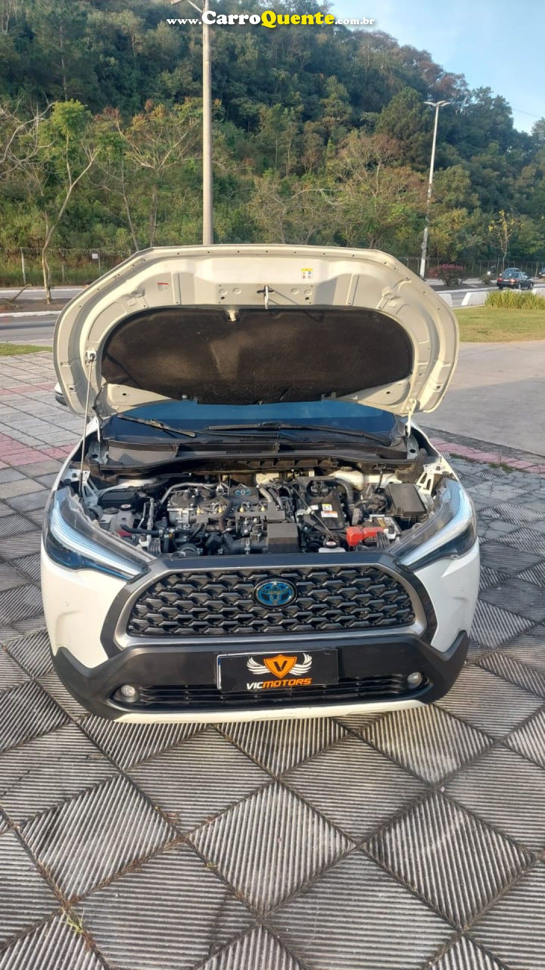 TOYOTA   COROLLA CROSS XRV 1.8 16V AUT.(HYBRID)   BRANCO 2023 1.8 FLEX E ELÉTRICO - Loja