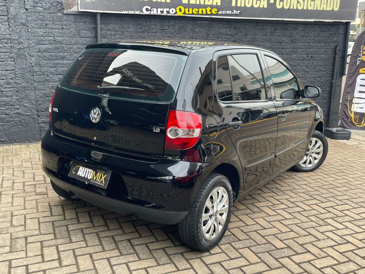 VOLKSWAGEN   FOX PLUS 1.6MI 1.6MI TOTAL FLEX 8V 4P   PRETO 2004 1.6 FLEX - Loja