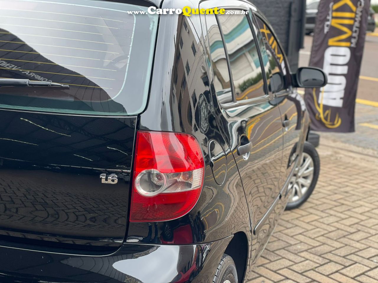 VOLKSWAGEN   FOX PLUS 1.6MI 1.6MI TOTAL FLEX 8V 4P   PRETO 2004 1.6 FLEX - Loja