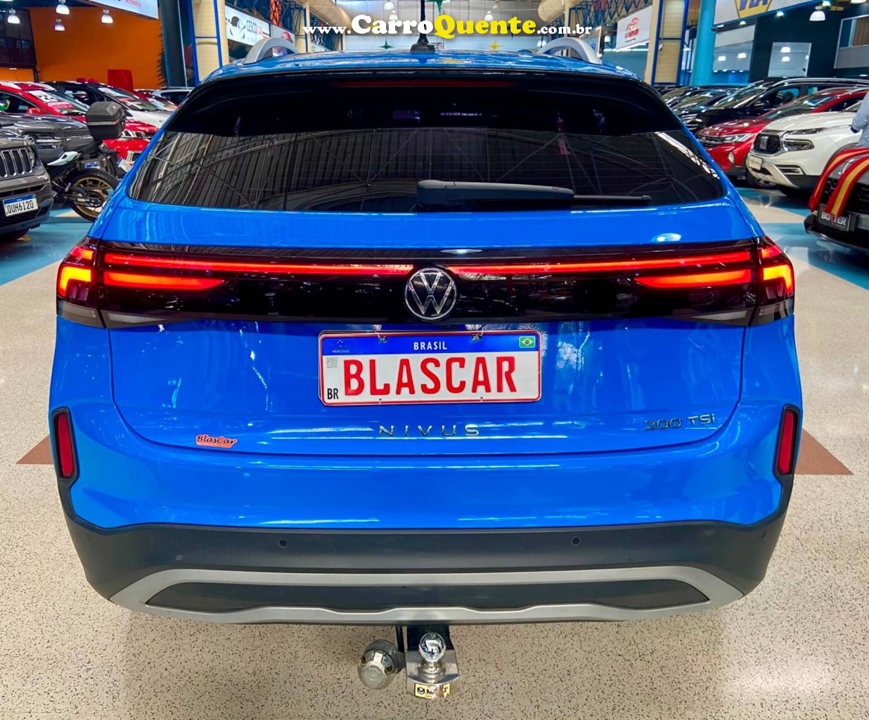 VOLKSWAGEN NIVUS 1.0 200 TSI TOTAL HIGHLINE 2025 - Loja