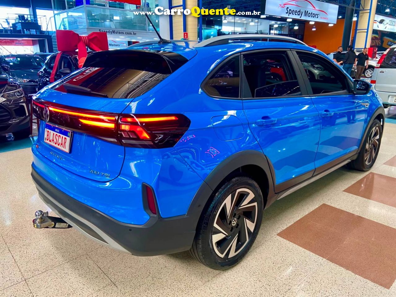 VOLKSWAGEN NIVUS 1.0 200 TSI TOTAL HIGHLINE 2025 - Loja