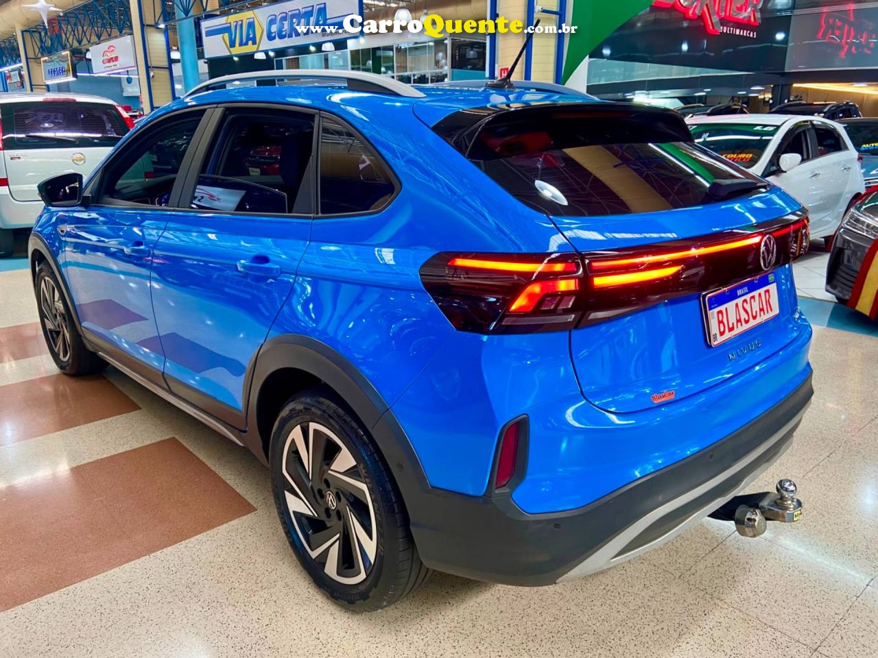 VOLKSWAGEN NIVUS 1.0 200 TSI TOTAL HIGHLINE 2025 - Loja