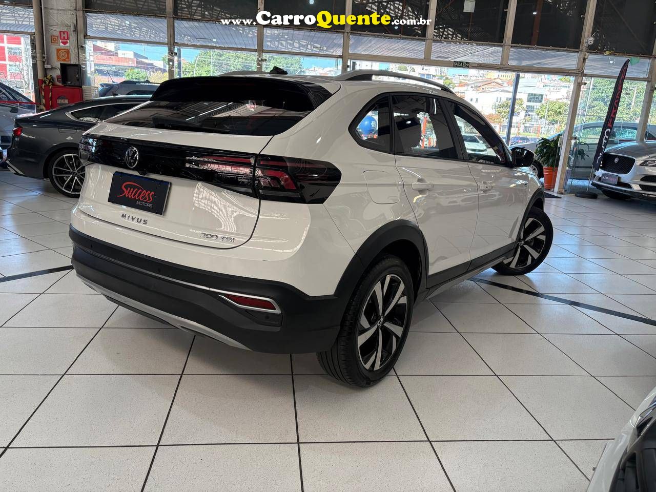 VOLKSWAGEN NIVUS 1.0 200 TSI TOTAL HIGHLINE 2024 - Loja