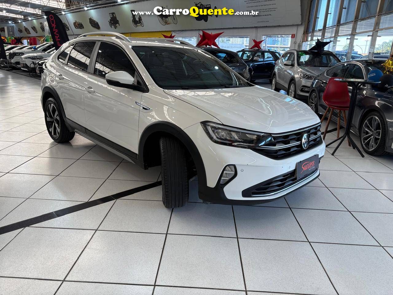 VOLKSWAGEN NIVUS 1.0 200 TSI TOTAL HIGHLINE 2024 - Loja