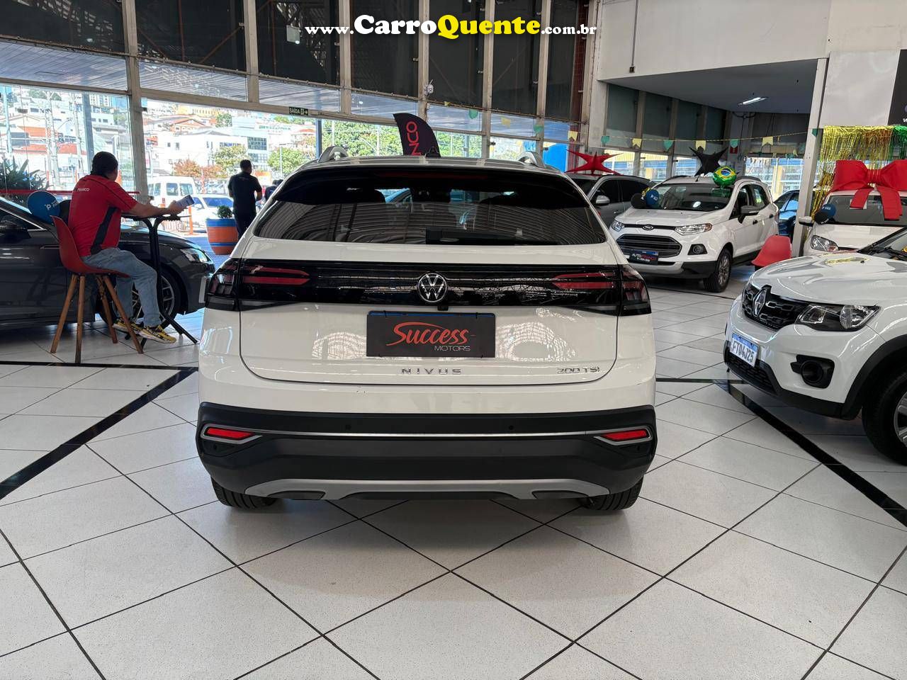 VOLKSWAGEN NIVUS 1.0 200 TSI TOTAL HIGHLINE 2024 - Loja