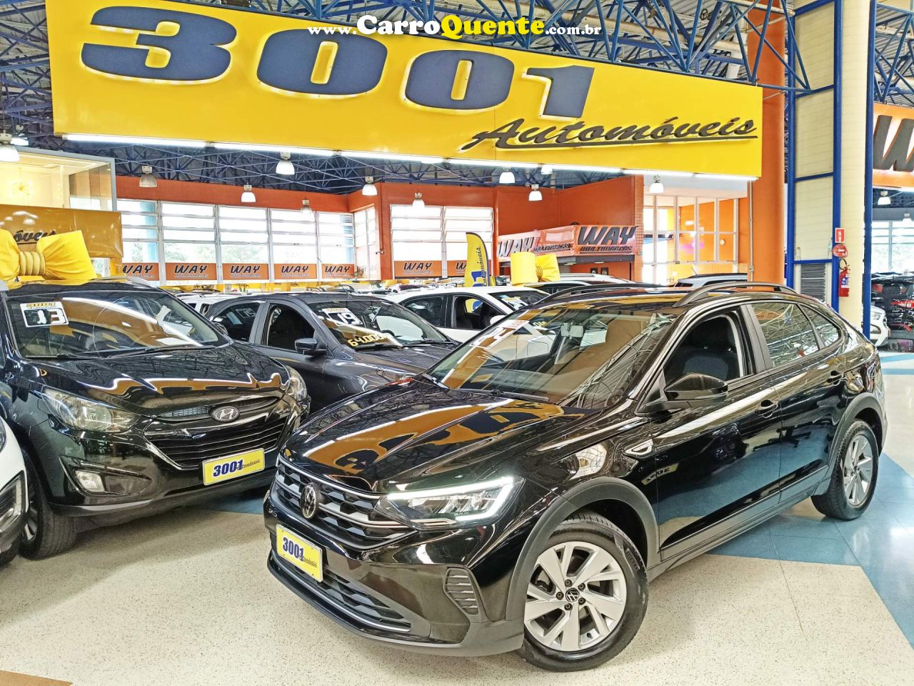VOLKSWAGEN NIVUS 1.0 200 TSI TOTAL COMFORTLINE 2024 - Loja