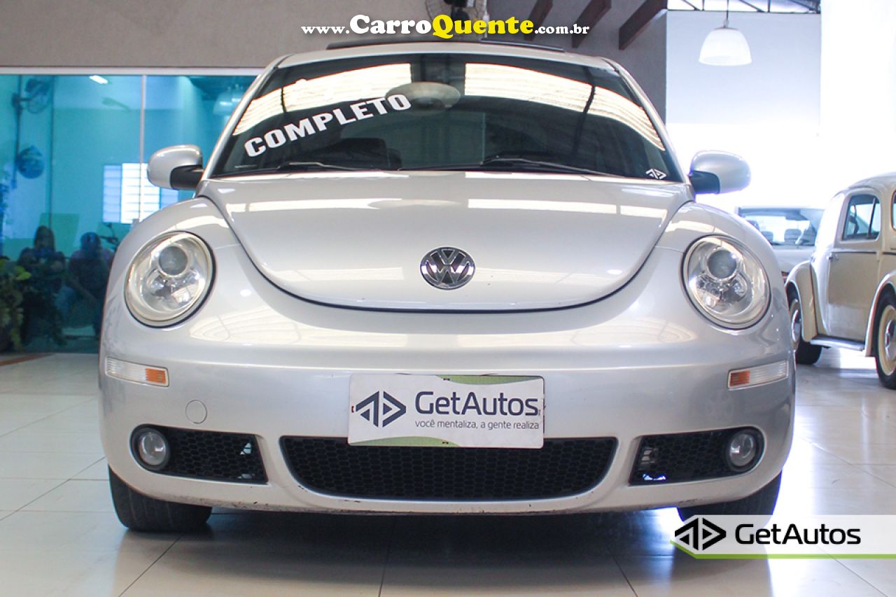 VOLKSWAGEN   NEW BEETLE 2.0 MI MEC.AUT.   PRATA 2010 2.0 GASOLINA - Loja