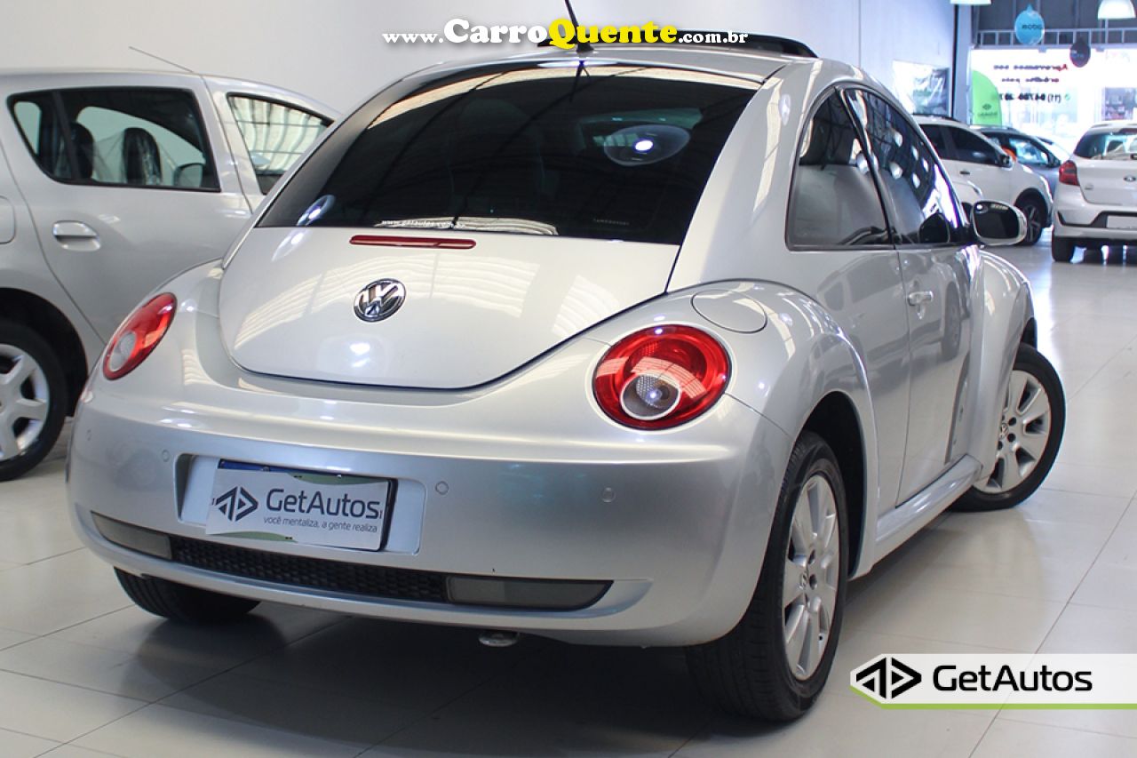 VOLKSWAGEN   NEW BEETLE 2.0 MI MEC.AUT.   PRATA 2010 2.0 GASOLINA - Loja