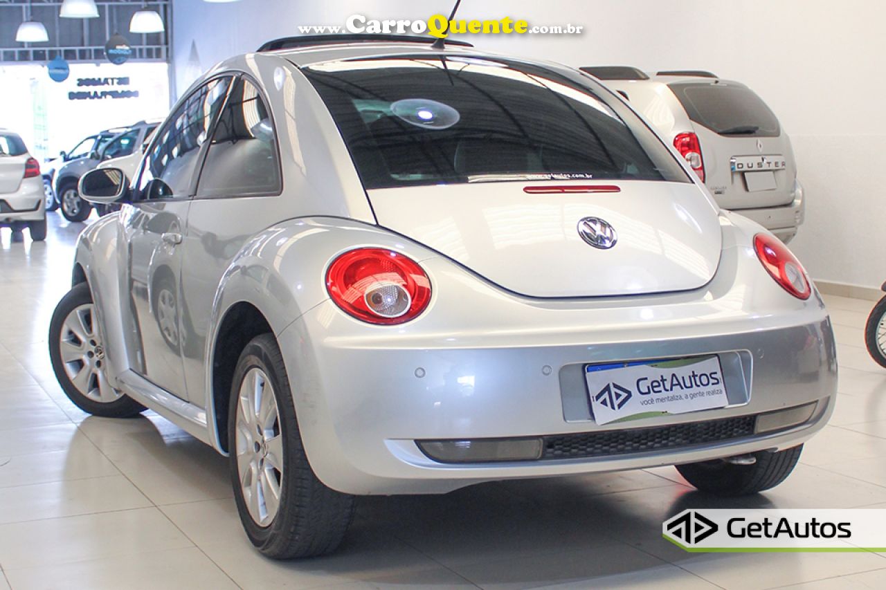 VOLKSWAGEN   NEW BEETLE 2.0 MI MEC.AUT.   PRATA 2010 2.0 GASOLINA - Loja