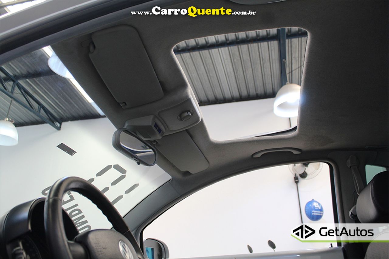 VOLKSWAGEN   NEW BEETLE 2.0 MI MEC.AUT.   PRATA 2010 2.0 GASOLINA - Loja