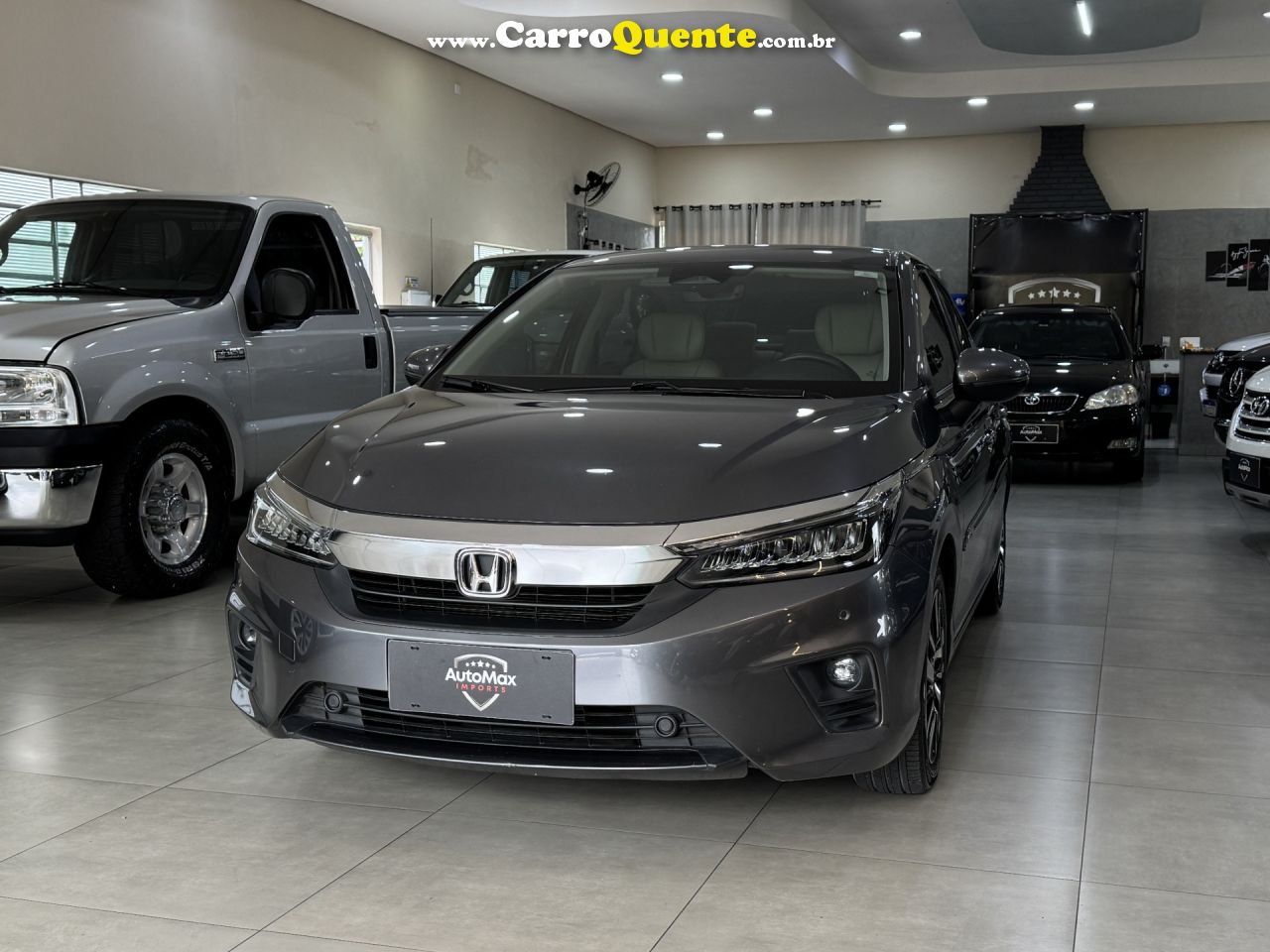 HONDA   CITY SEDAN TOURING 1.5 FLEX 16V 4P AUT.   CINZA 2022 1.5 FLEX - Loja