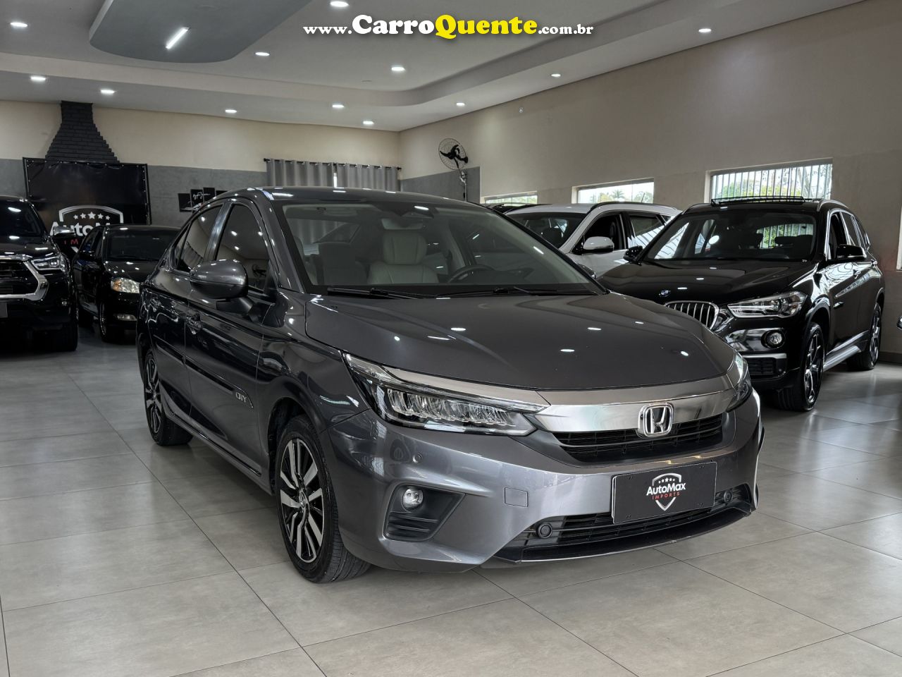 HONDA   CITY SEDAN TOURING 1.5 FLEX 16V 4P AUT.   CINZA 2022 1.5 FLEX - Loja