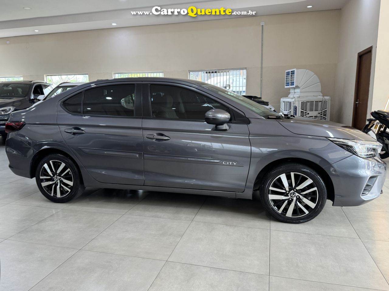 HONDA   CITY SEDAN TOURING 1.5 FLEX 16V 4P AUT.   CINZA 2022 1.5 FLEX - Loja