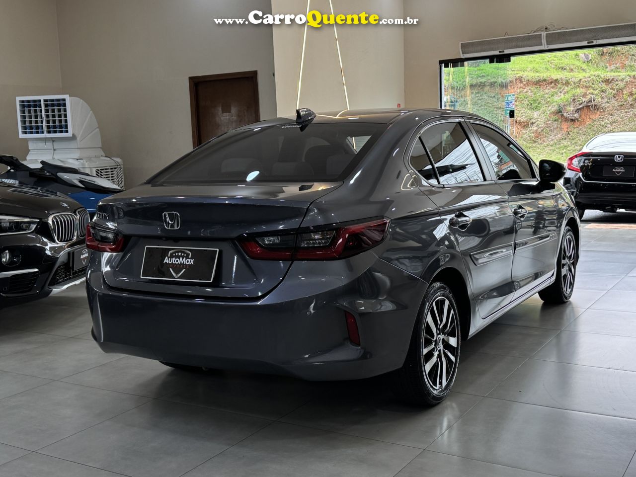 HONDA   CITY SEDAN TOURING 1.5 FLEX 16V 4P AUT.   CINZA 2022 1.5 FLEX - Loja